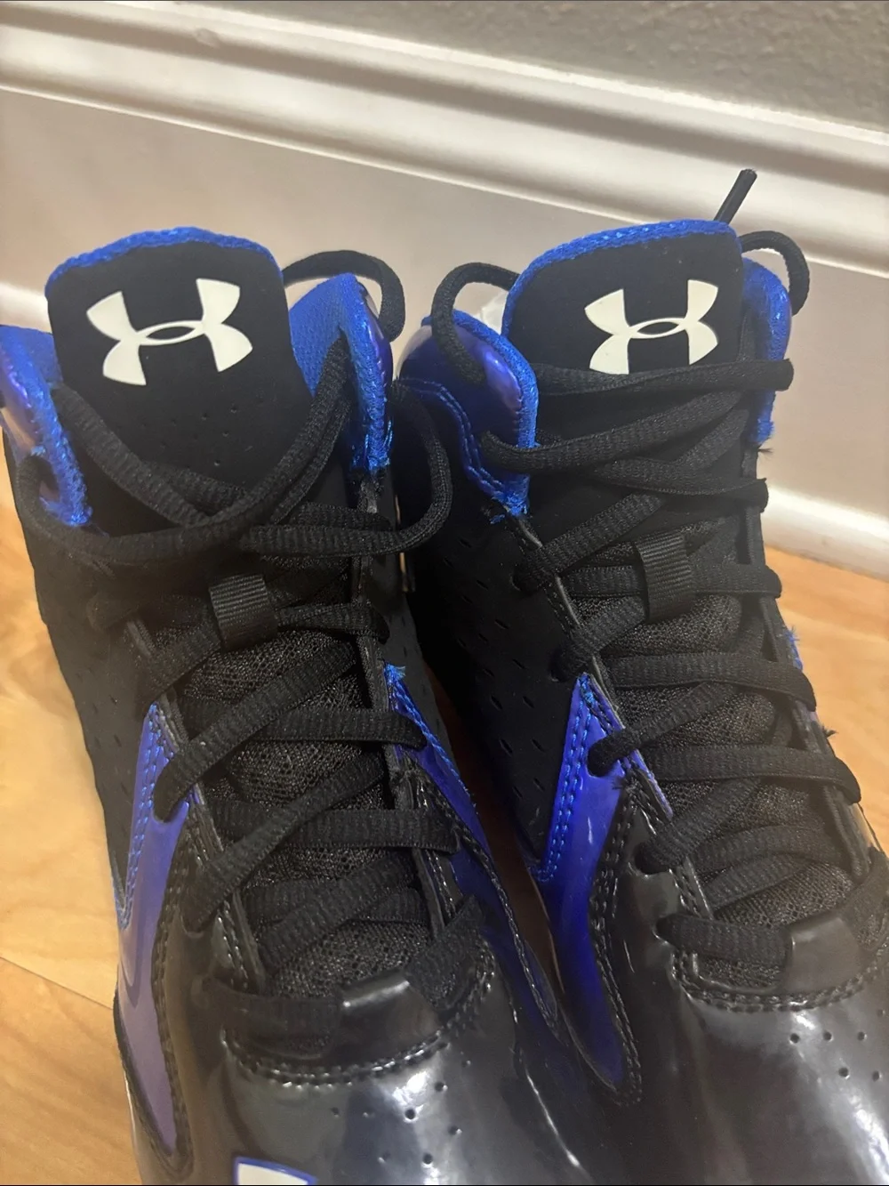Under Armour Kids Black and Blue Football Cleats